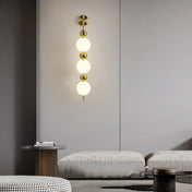 Applique murale LED dorée 3 boules aluminium Art Déco — vue 2
