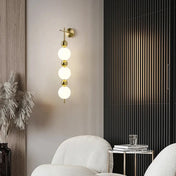 Applique murale LED dorée 3 boules aluminium Art Déco — vue 6