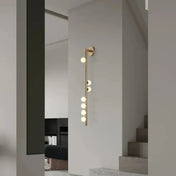 Applique murale LED dorée 3 globes en verre et métal noir — vue 10