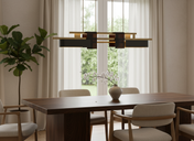 Lustre moderne salon KYO au design architectural, structure en laiton et verre, suspendu au plafond dans un intérieur contemporain