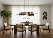 Lustre moderne salon KYO au design architectural, structure en laiton et verre, suspendu au plafond dans un intérieur contemporain