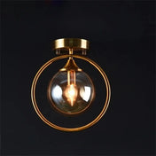 Plafonnier anneau doré boule verre chic | GIZOR