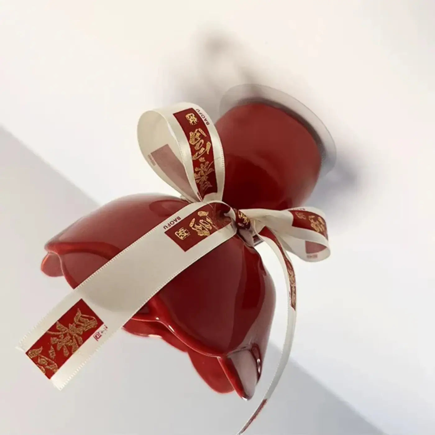 Plafonnier LED nœud décoratif rouge design | PODATU